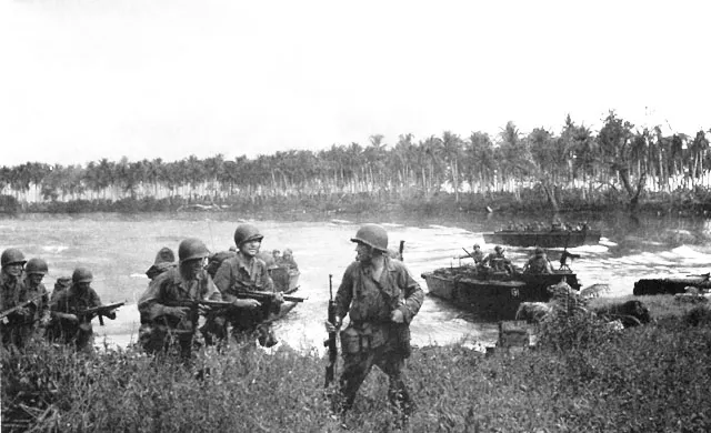 The first wave of American troops at Los Negros, Admiralty Islands, 1944.