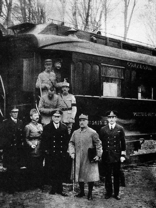 Marshal Ferdinand Foch (second from right) and Allied officers beside his railway carriage in the forest of Compiègne after the armistice was agreed, 11 November 1918.
