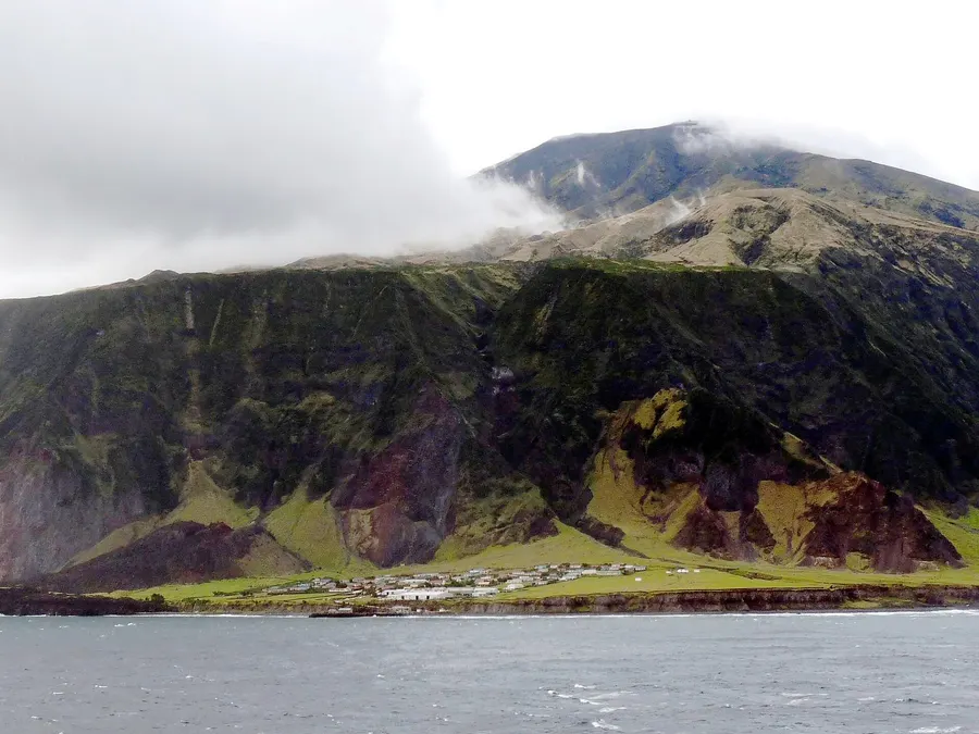 Tristan da Cunha from the sea, with the settlement of Edinburgh of the Seven Seas on the coastal plain below the volcano