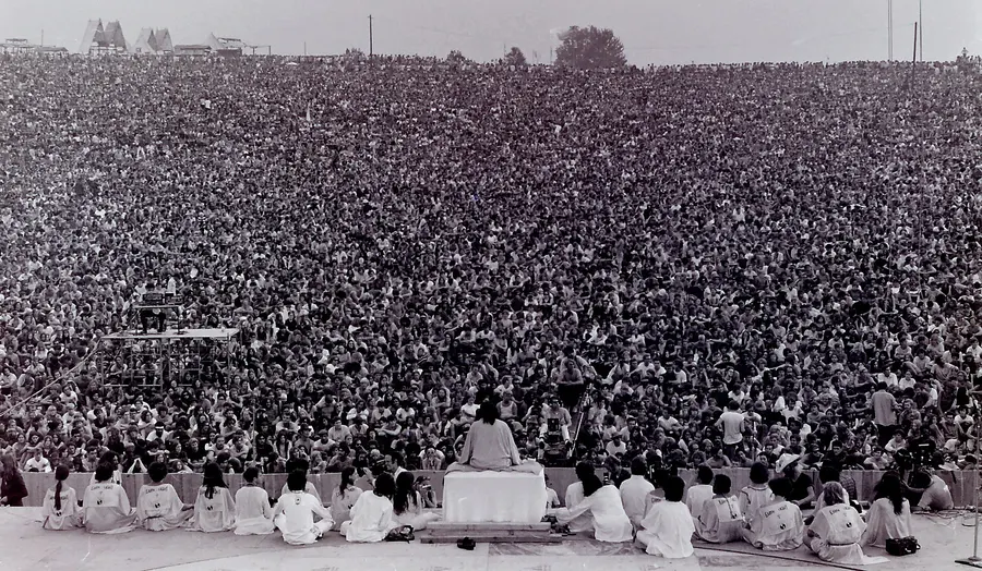 The vast crowd at the opening ceremony of the Woodstock festival, 15 August 1969, photographed by Mark Goff