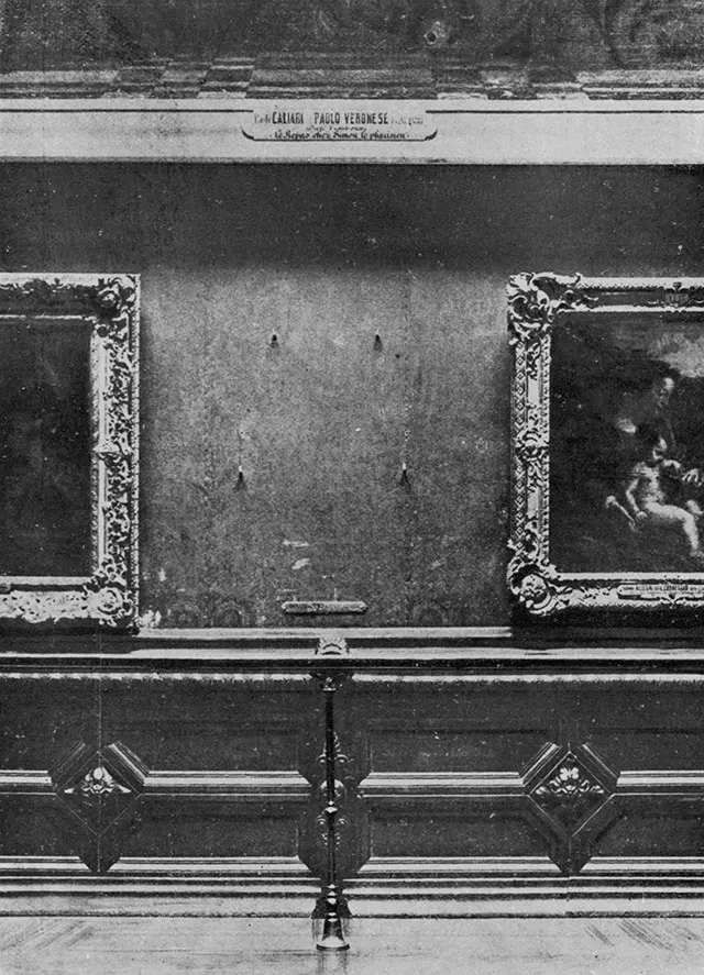 The empty space on the wall of the Salon Carré in the Louvre after the Mona Lisa was stolen in 1911