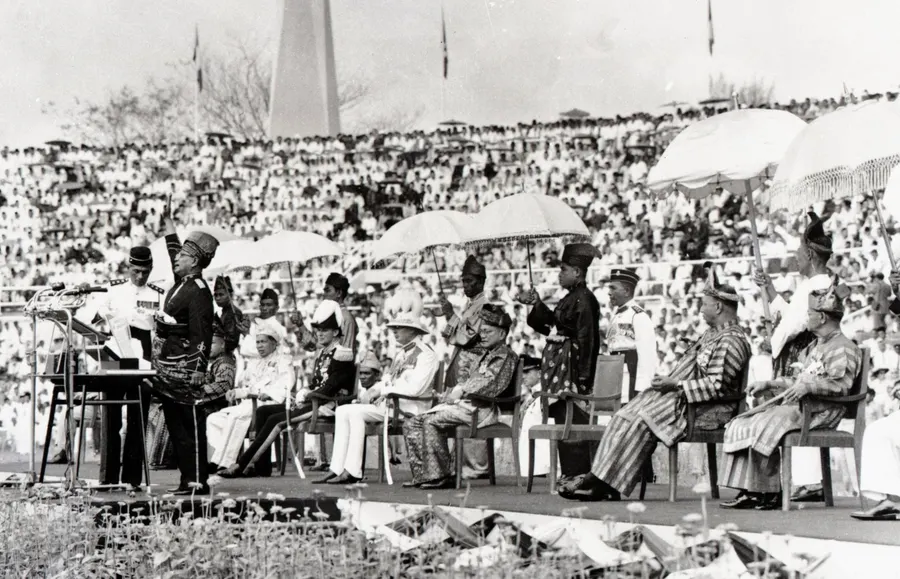Tunku Abdul Rahman proclaims the independence of the Federation of Malaya at Merdeka Stadium in Kuala Lumpur on 31 August 1957
