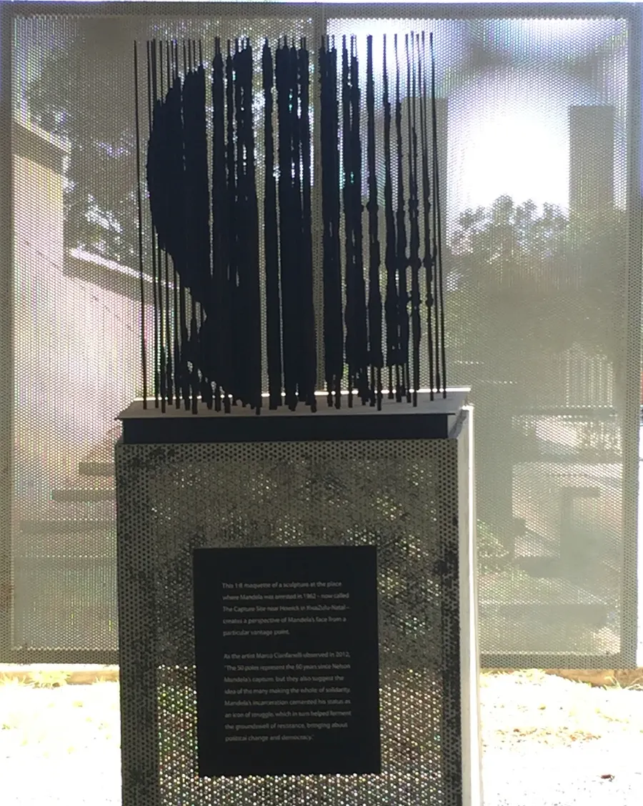 Marco Cianfanelli's portrait of Mandela made from steel columns, a version of his sculpture at the capture site near Howick