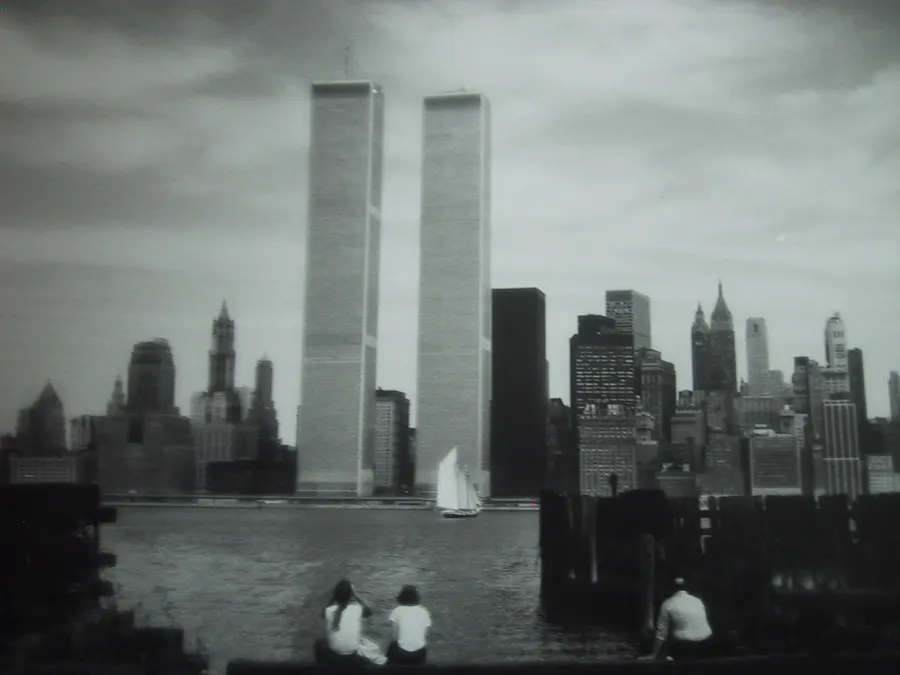 The Twin Towers of the World Trade Center rising above Lower Manhattan in the 1970s, photographed by Edgar de Evia