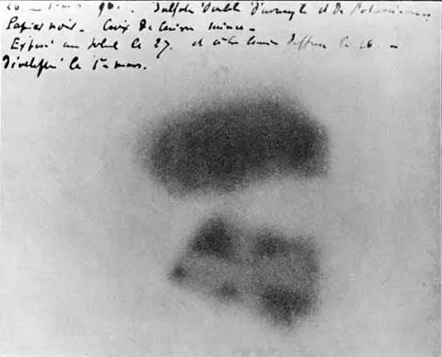 One of Henri Becquerel's photographic plates, darkened by radiation from uranium salts, with his handwritten notes.
