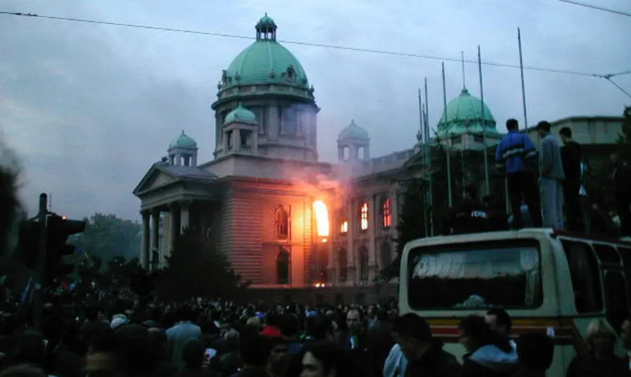 The federal parliament in Belgrade on fire during the protests of 5 October 2000.