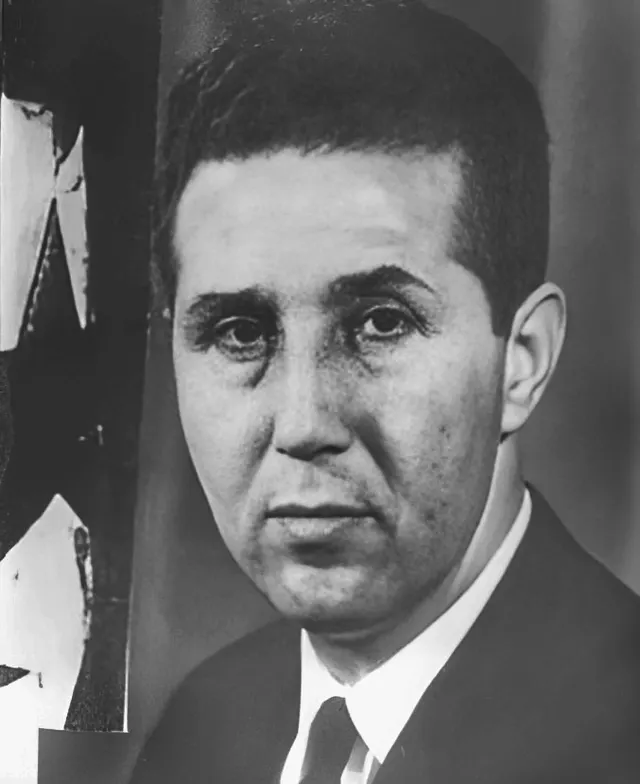 Ahmed Ben Bella, who led the Algerian delegation and became president the following year.