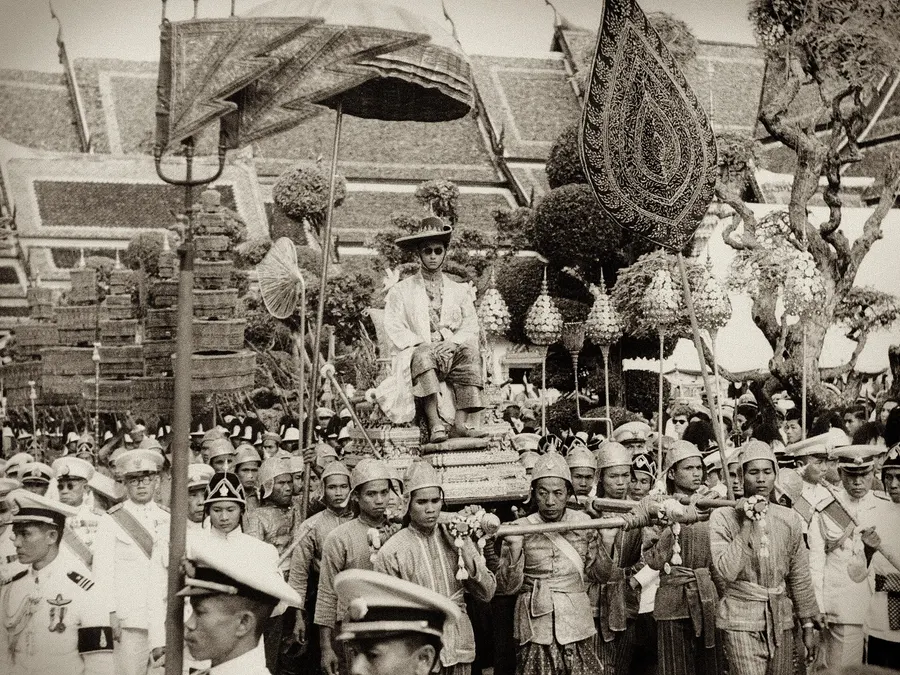 King Bhumibol carried in the royal procession at his coronation, 1950.