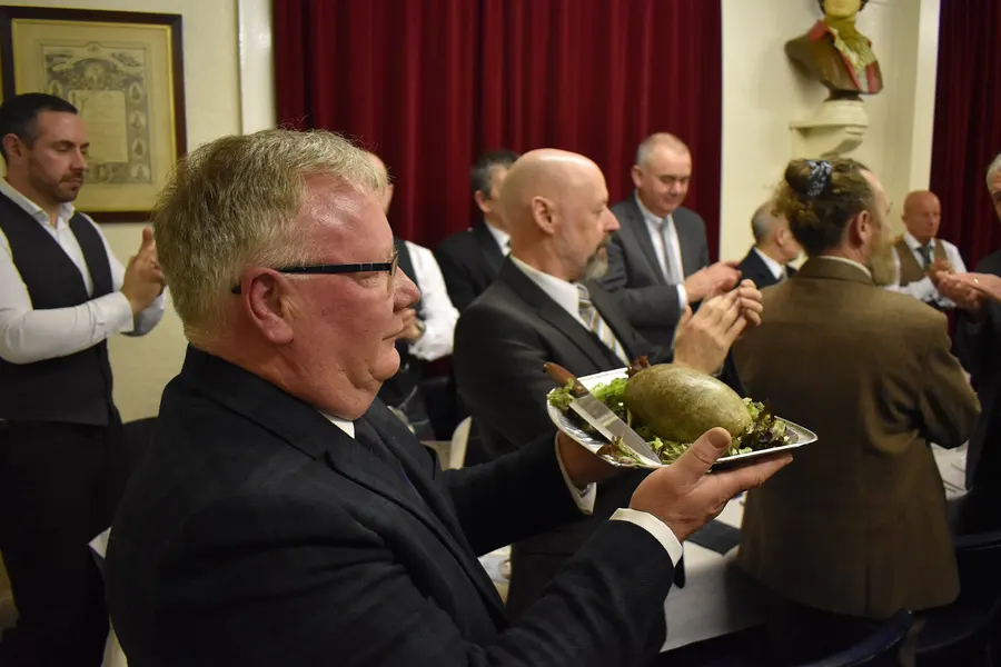 The haggis is carried in at the Dundee Burns Club's 160th annual Burns supper, 25 January 2020.