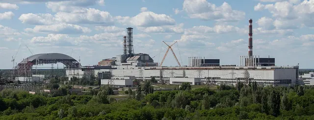 The Chernobyl nuclear power plant, with the containment arch over reactor four.