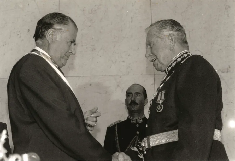 Augusto Pinochet hands power to the elected president, Patricio Aylwin, in March 1990.