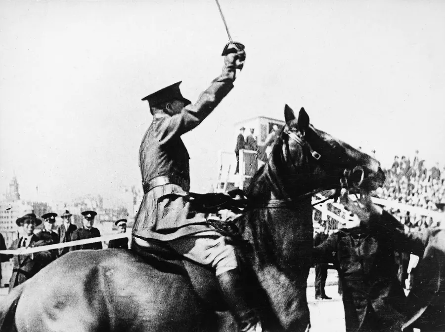 Francis de Groot slashes the ribbon at the opening of the Sydney Harbour Bridge, 19 March 1932.