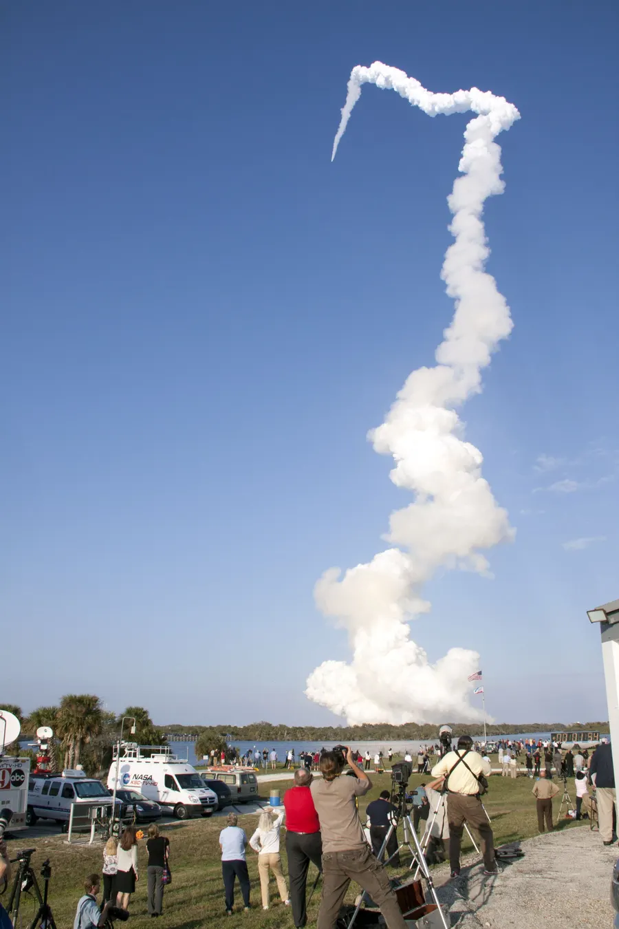 Space Shuttle Discovery climbs away from Kennedy Space Center on its final mission, STS-133, February 2011.