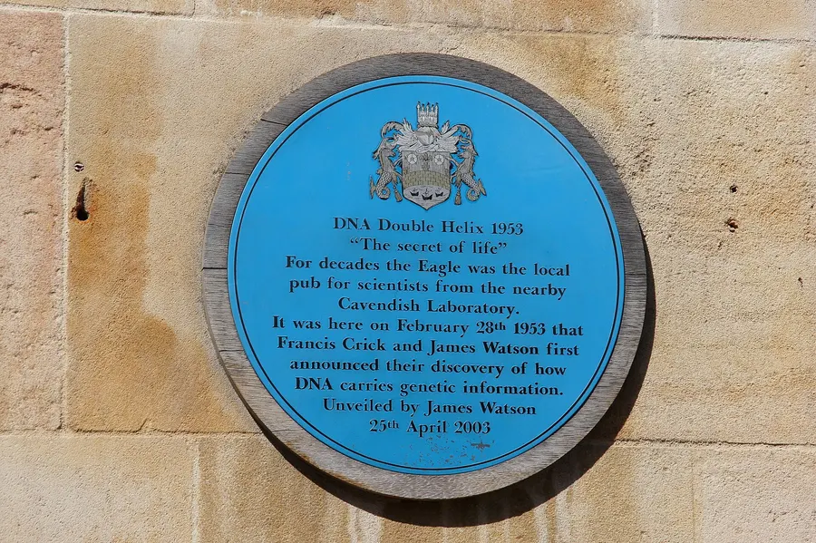 The blue plaque outside the Eagle pub in Cambridge, where Crick and Watson announced their discovery.