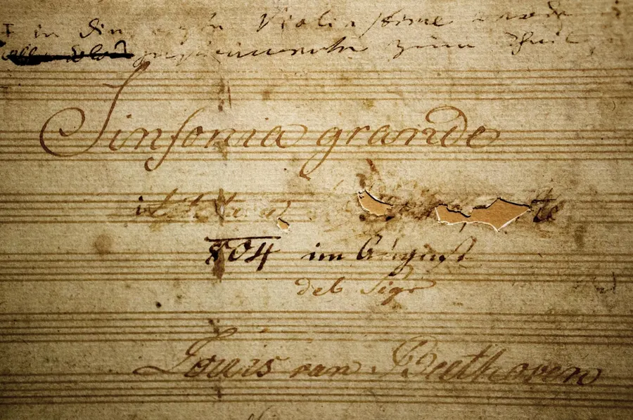 The title page of Beethoven's own copy of the Eroica symphony, with Napoleon's name scratched out.