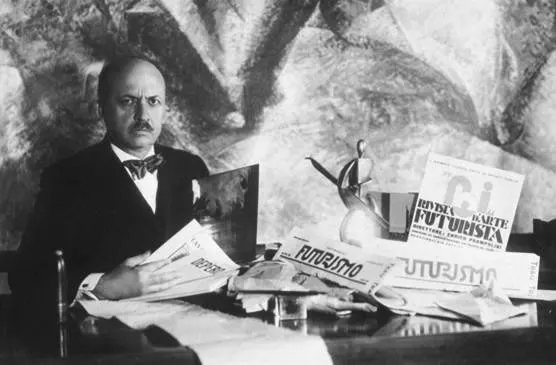 Filippo Tommaso Marinetti with Futurist newspapers, in a press photograph of about 1909.