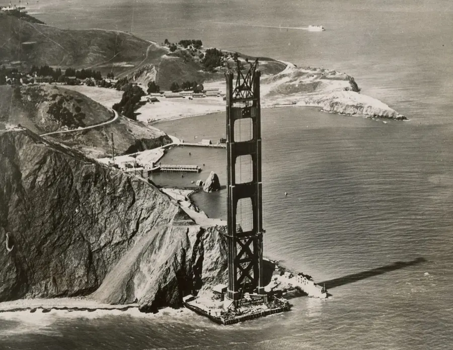 The north tower of the Golden Gate Bridge rising on the Marin shore, in a press photograph of August 1934.