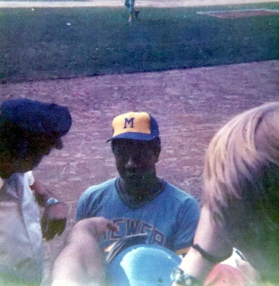 Hank Aaron signing autographs at Tiger Stadium, Detroit, in 1975.