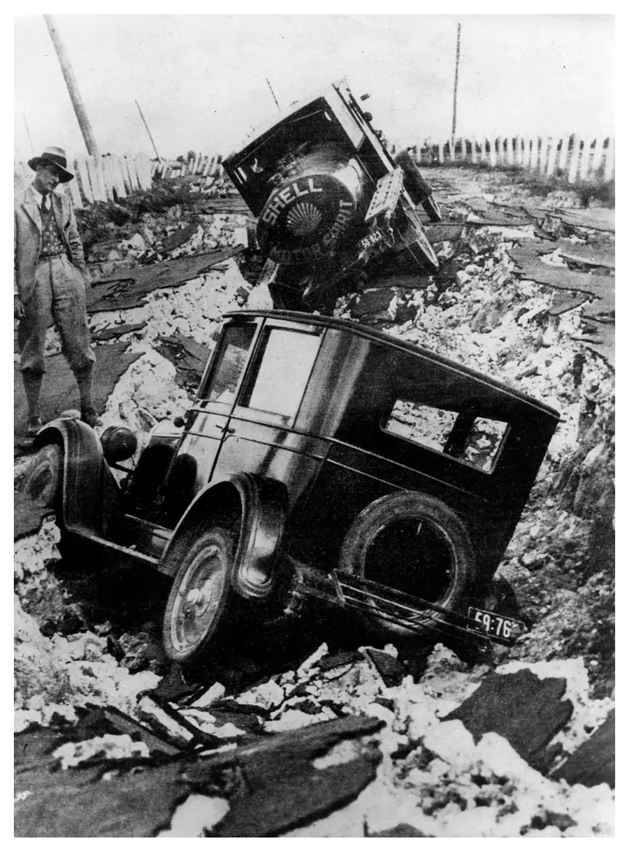 A car wrecked among the rubble after the Hawke's Bay earthquake of 1931 (Archives New Zealand).