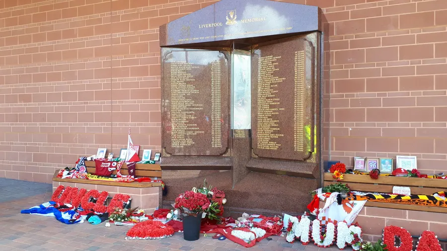 The Hillsborough memorial at Anfield, Liverpool, with flowers and scarves.