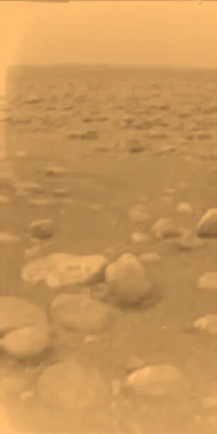 The surface of Titan, photographed by the Huygens probe after landing on 14 January 2005.
