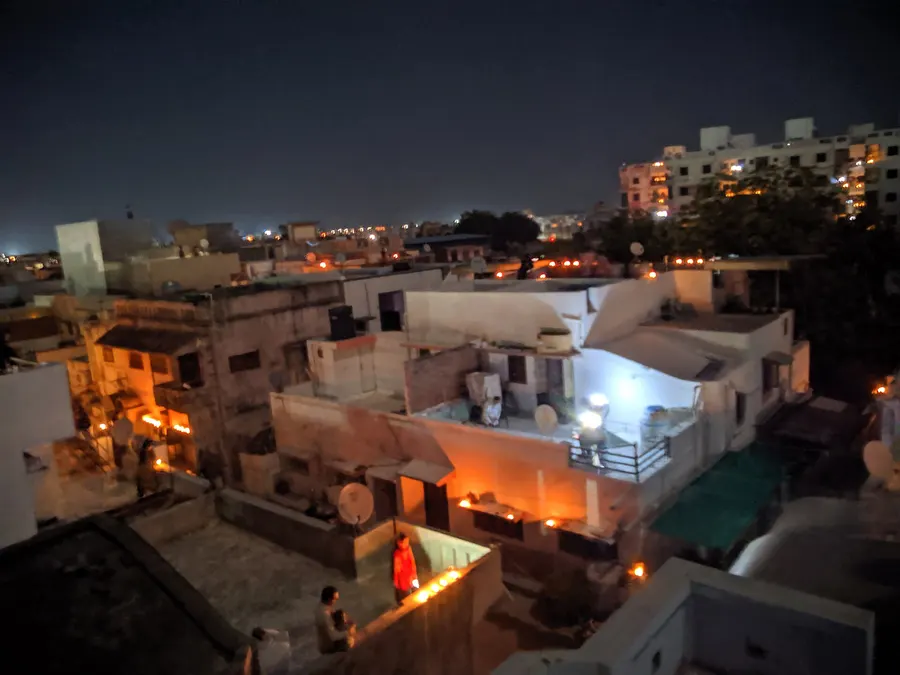 Lamps lit across a city at night during India's lockdown, 5 April 2020.