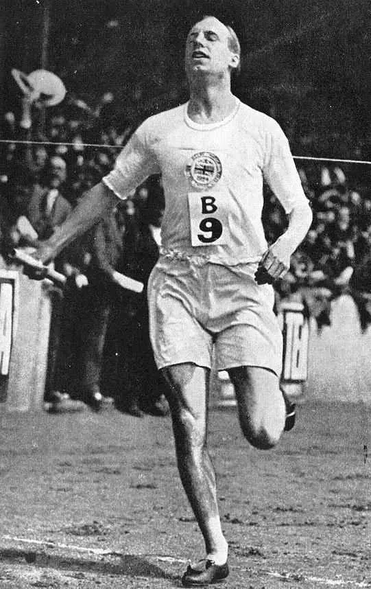 Eric Liddell racing in the 1920s, head thrown back in his famous style