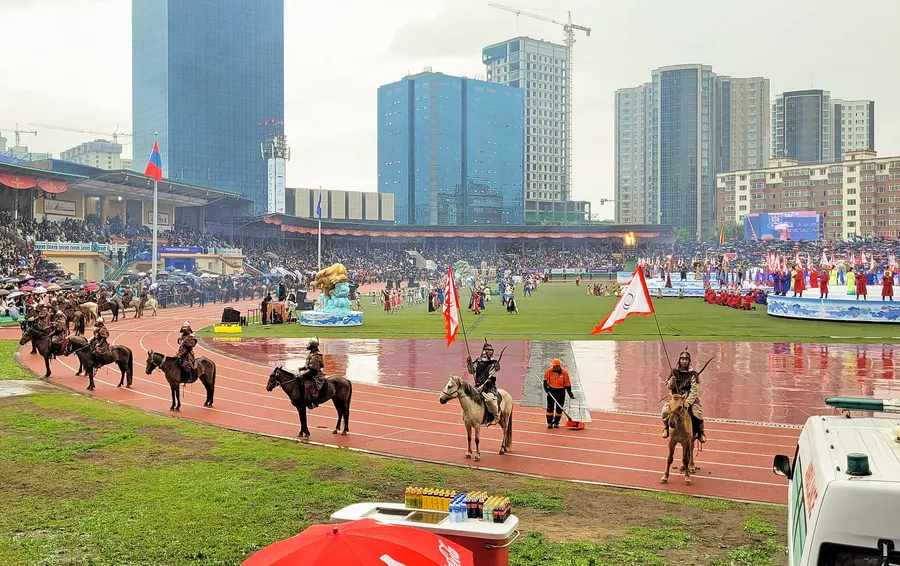 Horse riders parade in the opening ceremony of Naadam at the national stadium in Ulaanbaatar, 2023