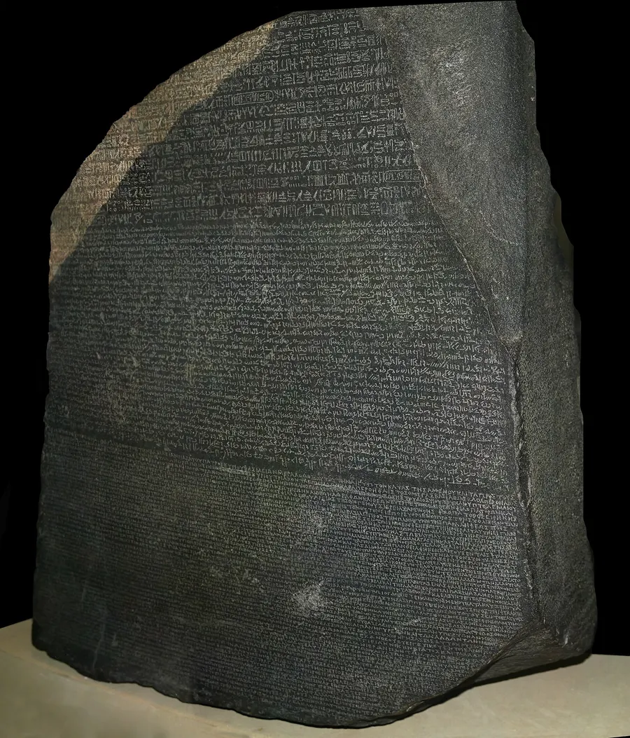 The Rosetta Stone on display in the British Museum, with its three scripts: hieroglyphs, demotic and Greek