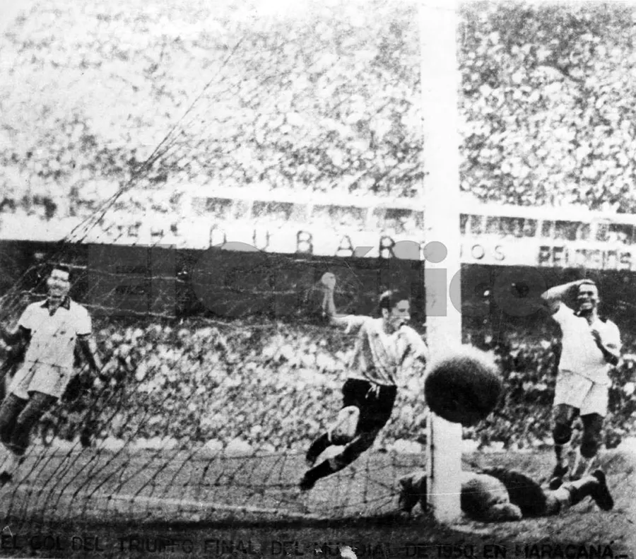 Alcides Ghiggia's shot goes past the Brazilian goalkeeper Barbosa for Uruguay's winning goal at the Maracanã, 16 July 1950