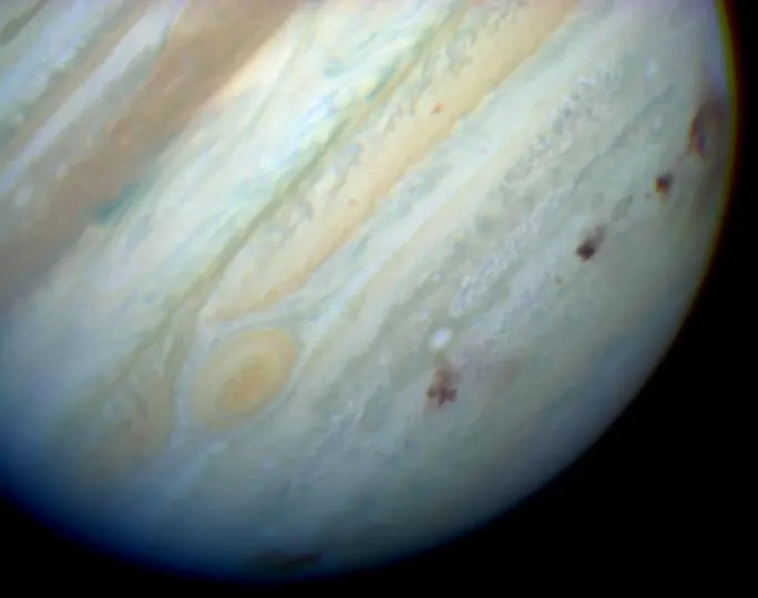 Dark impact scars from the comet fragments in Jupiter's southern hemisphere, seen by the Hubble Space Telescope