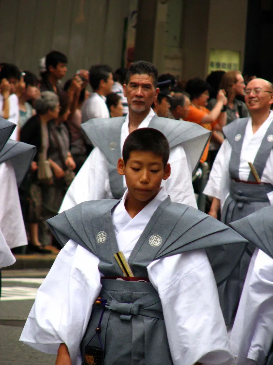 Boys in ceremonial dress taking part in the Gion Festival in Kyoto
