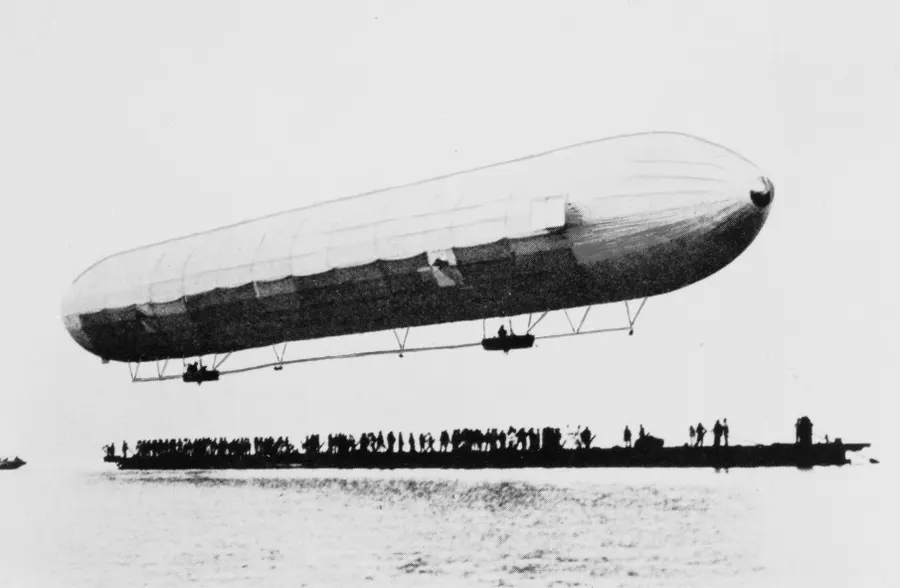 LZ 1, the first Zeppelin, rises from its floating hangar on Lake Constance, 1900