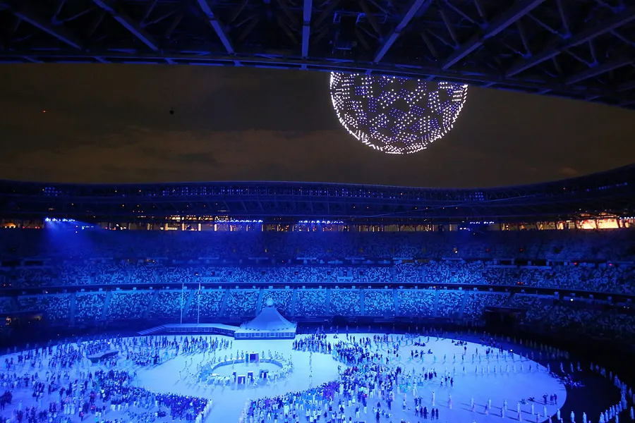 Drones form a globe above the Olympic Stadium during the opening ceremony of the Tokyo Games
