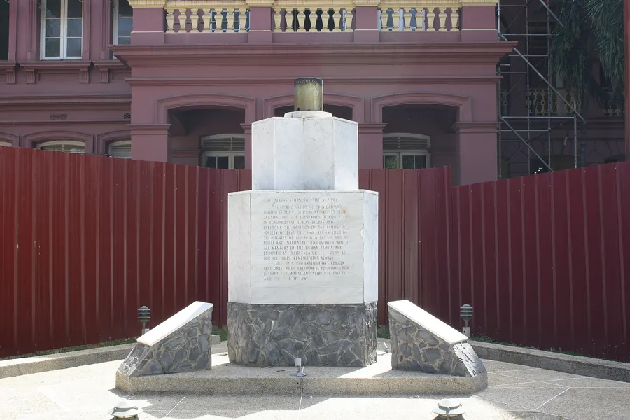 The eternal flame and memorial to the 1990 coup attempt outside the Red House in Port of Spain