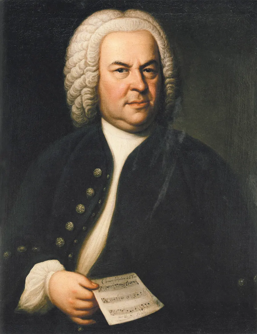 Johann Sebastian Bach in a portrait by Elias Gottlob Haussmann, holding a sheet of music