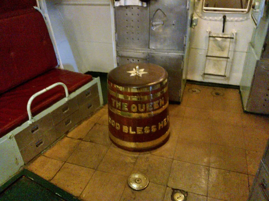 The rum tub of the destroyer HMS Cavalier, lettered 'The Queen, God Bless Her', from which sailors' tots were served