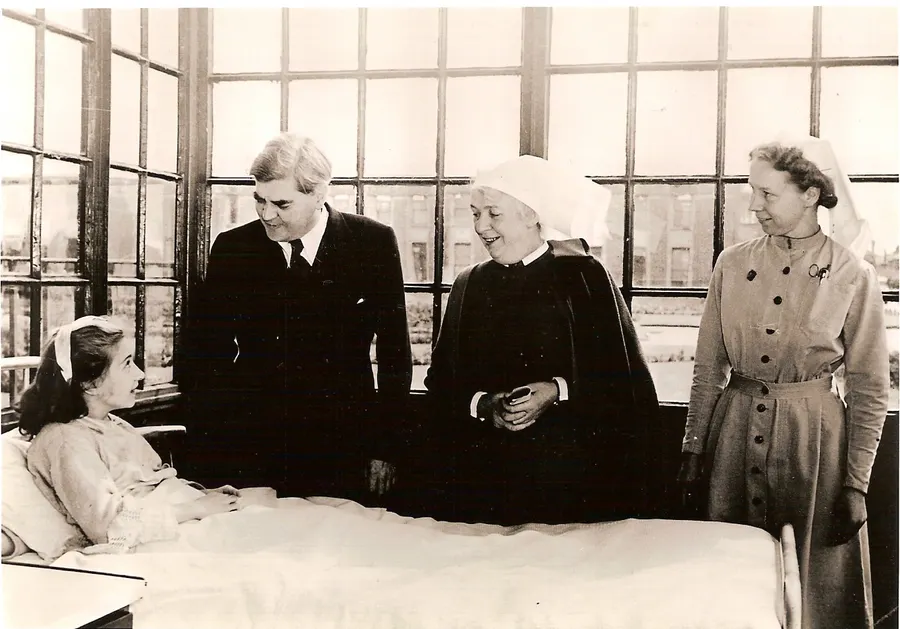 Aneurin Bevan, Minister of Health, meets a young patient at Park Hospital, Davyhulme, near Manchester, on the first day of the NHS, 5 July 1948