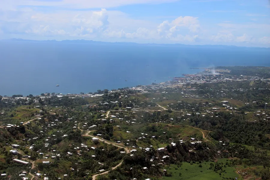 Honiara, the capital of Solomon Islands, on the north coast of Guadalcanal, seen from the air in 2013