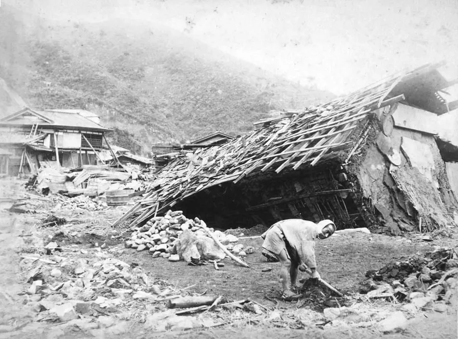 Wrecked houses at Kamaishi in Iwate after the 1896 tsunami, photographed by Matsuchi Nakajima