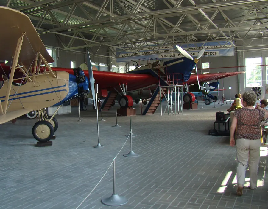 The long-winged ANT-25 (in red), the aircraft type Chkalov flew over the pole, on display in the Chkalov museum at Chkalovsk, Russia
