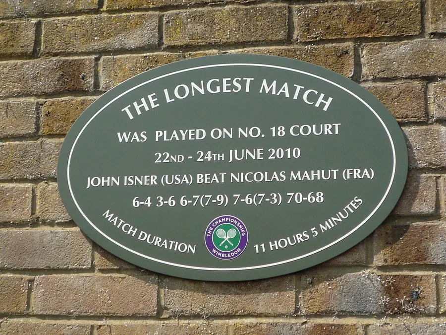 The plaque on Wimbledon's Court 18 commemorating the match between John Isner and Nicolas Mahut, 22 to 24 June 2010