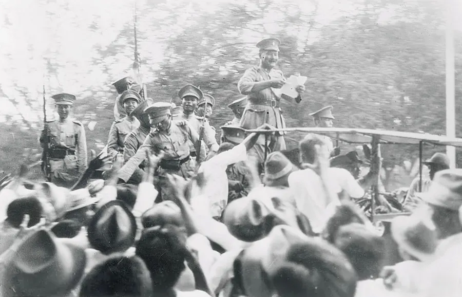 Phraya Phahon reads the People's Party manifesto to troops in the Royal Plaza, Bangkok, on 24 June 1932