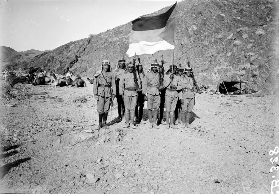 Soldiers of the Arab Revolt with their flag in the Hejaz, photographed by Maurice Bauche