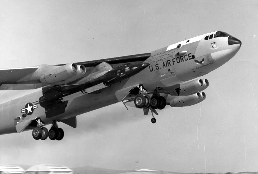 A Boeing NB-52 mother ship taking off with an X-15 rocket plane carried under its right wing
