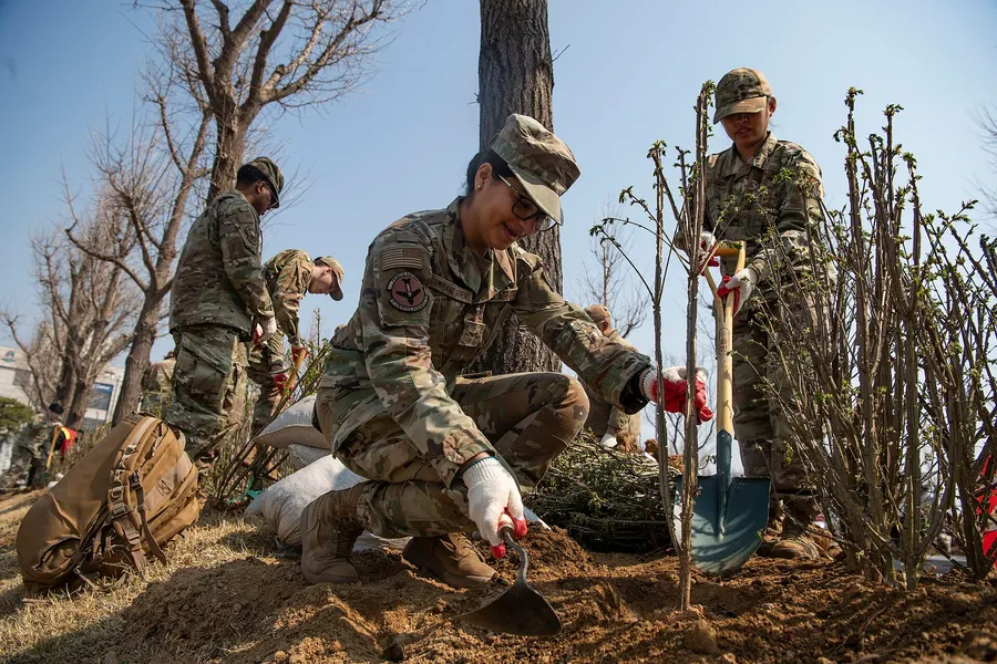 US airmen join a local Arbor Day tree planting in Pyeongtaek, South Korea, 2025.