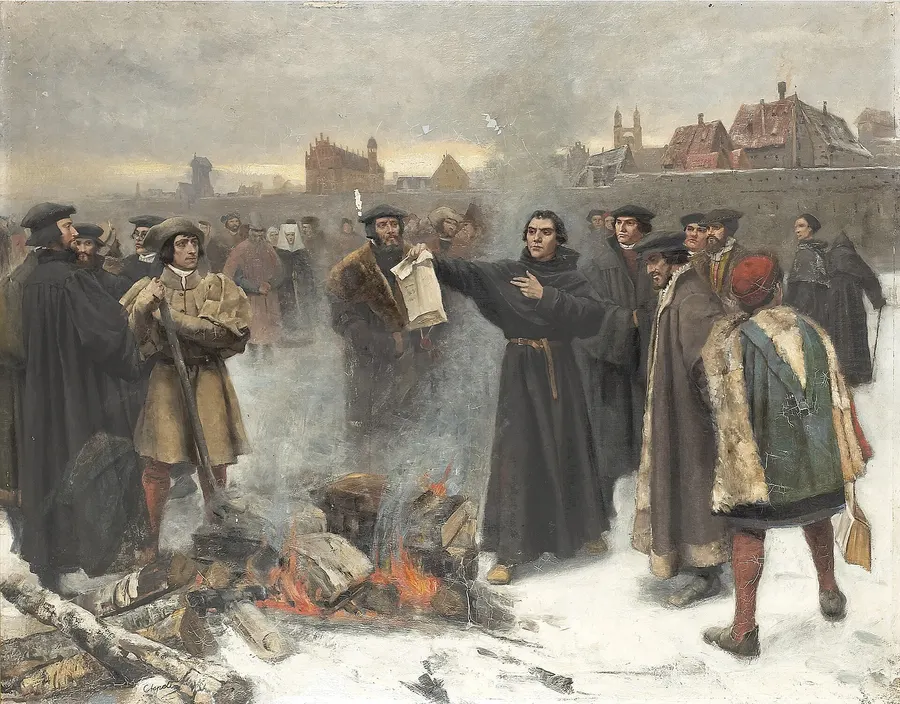 Luther burns the papal bull that threatened him with excommunication, in a painting by Karl Aspelin, 1885.