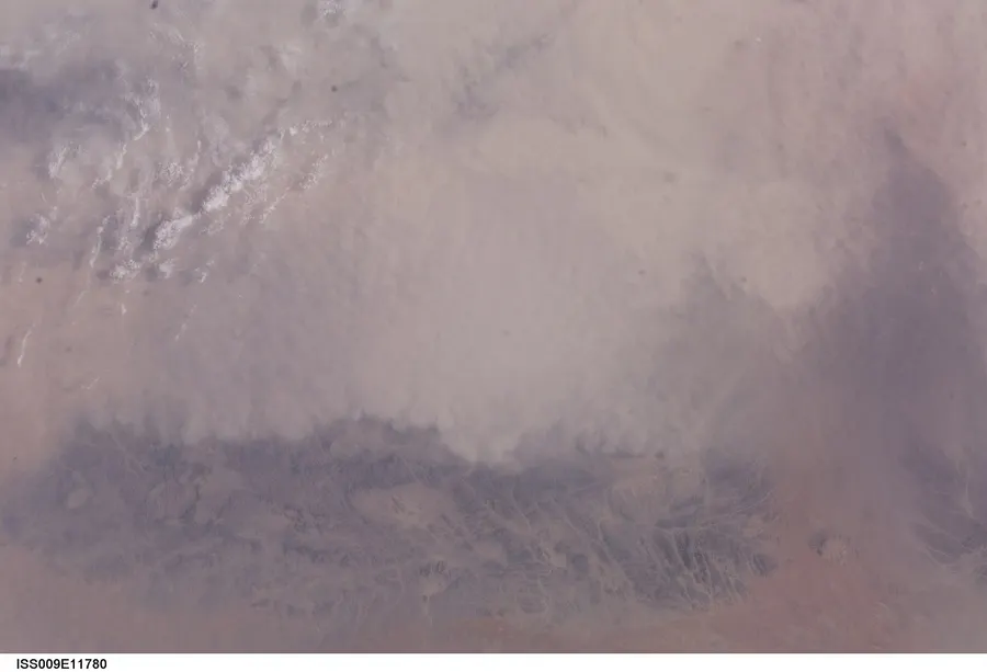 The desert hills of Balochistan in western Pakistan, where the tests were carried out, seen from the International Space Station in 2004