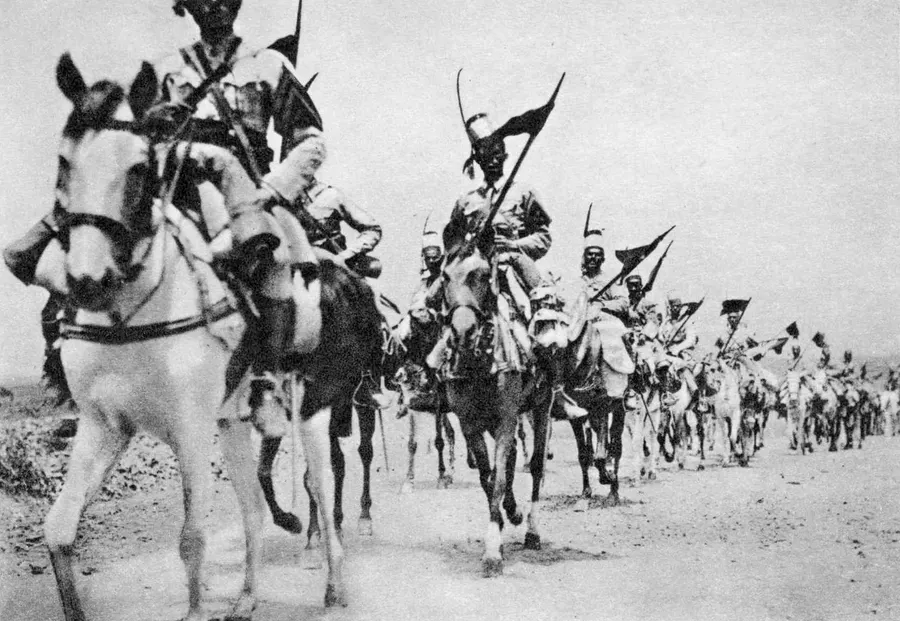 A 1936 Italian photograph of colonial cavalry advancing towards Addis Ababa
