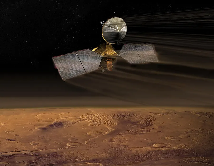 An artist's impression of the Mars Reconnaissance Orbiter skimming the Martian atmosphere.